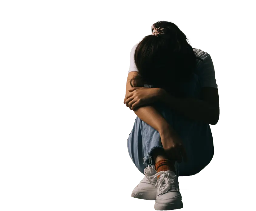 Family-Violence-Crying girl with her head in her lap involved in family violence case