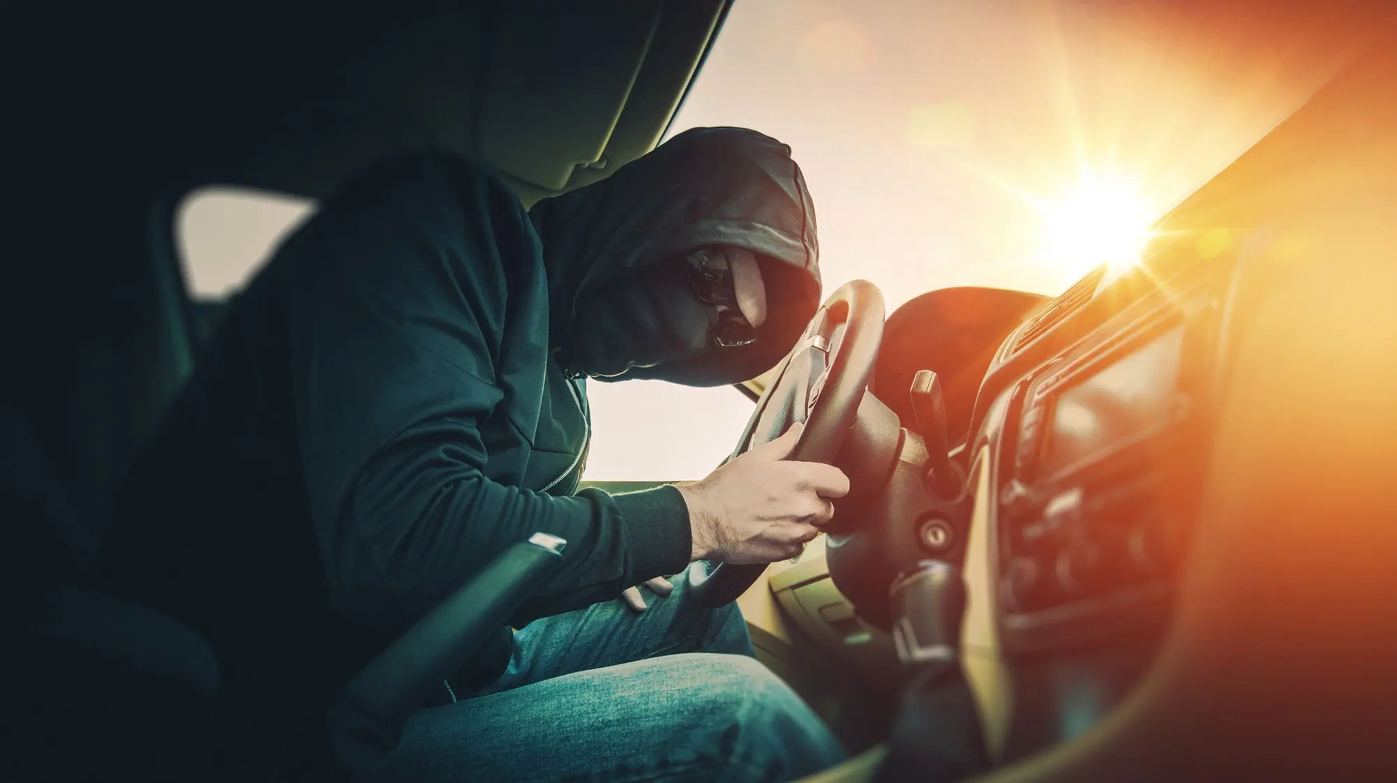 man stealing a car in theft robbery burglary