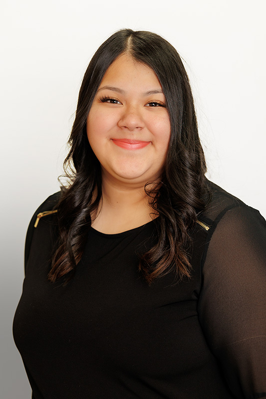 Liana Hernandez, bilingual Case Manager at the Brushe Law firm in Sugar Land, Texas.